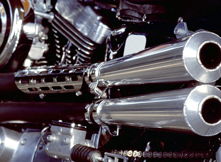 Close up image of twin exhaust on motorcycle